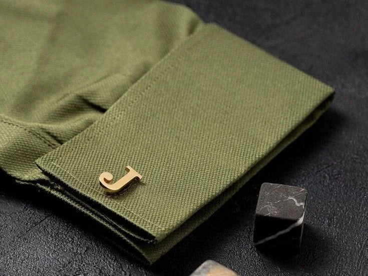 Single initial cufflink